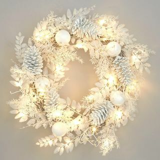Předsvícený zimní bílý vánoční věnec