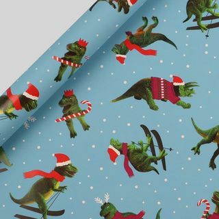 Lyžování dinosauři vánoční balicí papír 